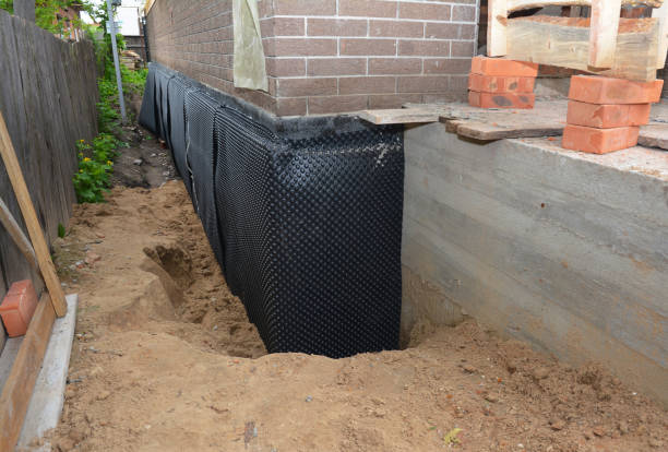 Happy homeowners after waterproofing job in Neshanic Station